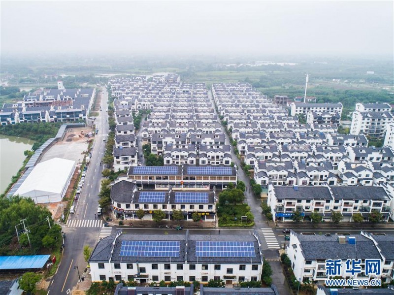 浙江長興:光伏發(fā)電示范村500余戶項目陸續(xù)并網(wǎng)發(fā)電(組圖)